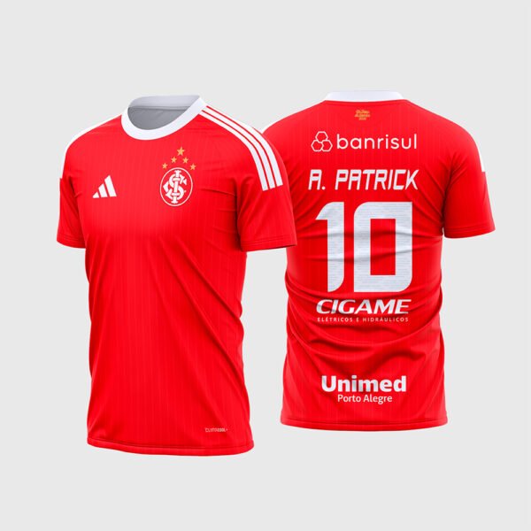 Arte Camisa Internacional Titular 2026 2027.jpg apresenta o mockup do uniforme titular do Internacional na cor vermelha com linhas verticais em marca d'água, gola e três listras brancas, patrocínios Banrisul, Cigame e Unimed Porto Alegre, e layout traseiro oficial com o número 10 e nome A. Patrick para sublimação total CorelDRAW.